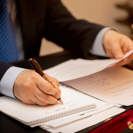 Businessman signing important contract papers Businessman signing important contract papers. High quality photo