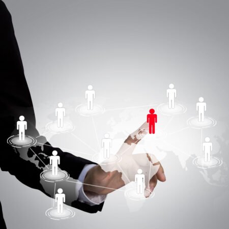 Social Network concept : hand point to social network and world Social Network concept : hand point to social network and world map